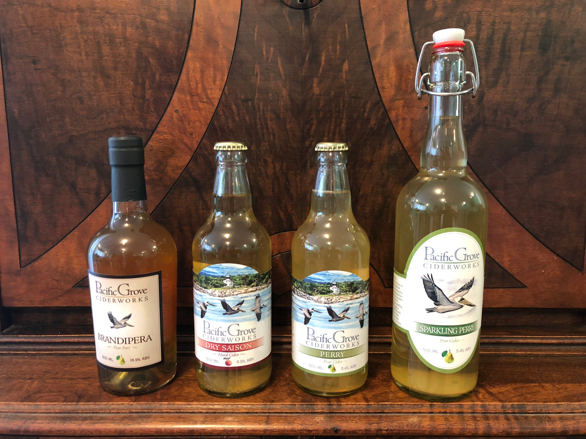 Our 4 ciders. Pear port, dry saison cider, pear cider and sparkling perry.